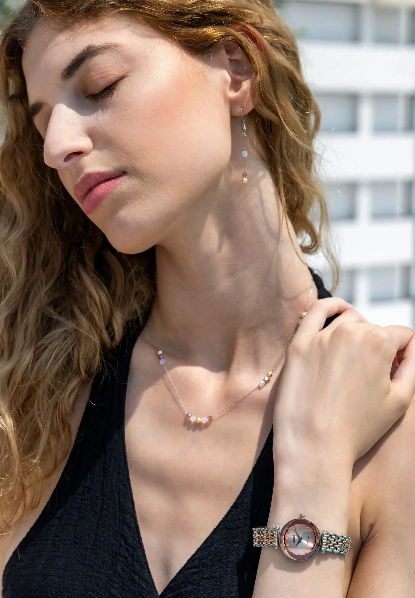 Jowissa Swiss Made Crystal Essence in stainless steel with a bicolor bracelet in silver/rose gold matching the jewelry set in a fine pear-like look featuring shiny round Austrian crystals.