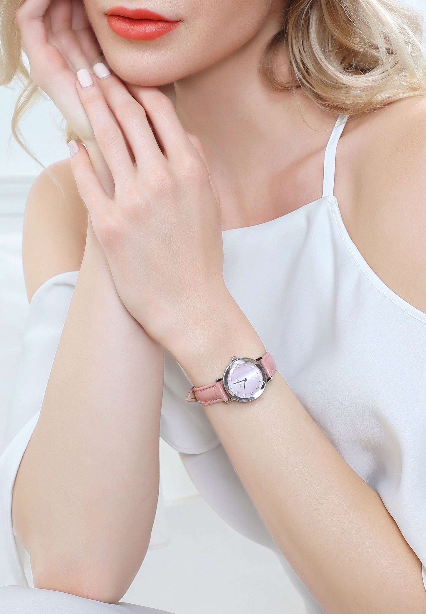 a special diamond cut swiss ladies watch with pink dial and strap womans fashion