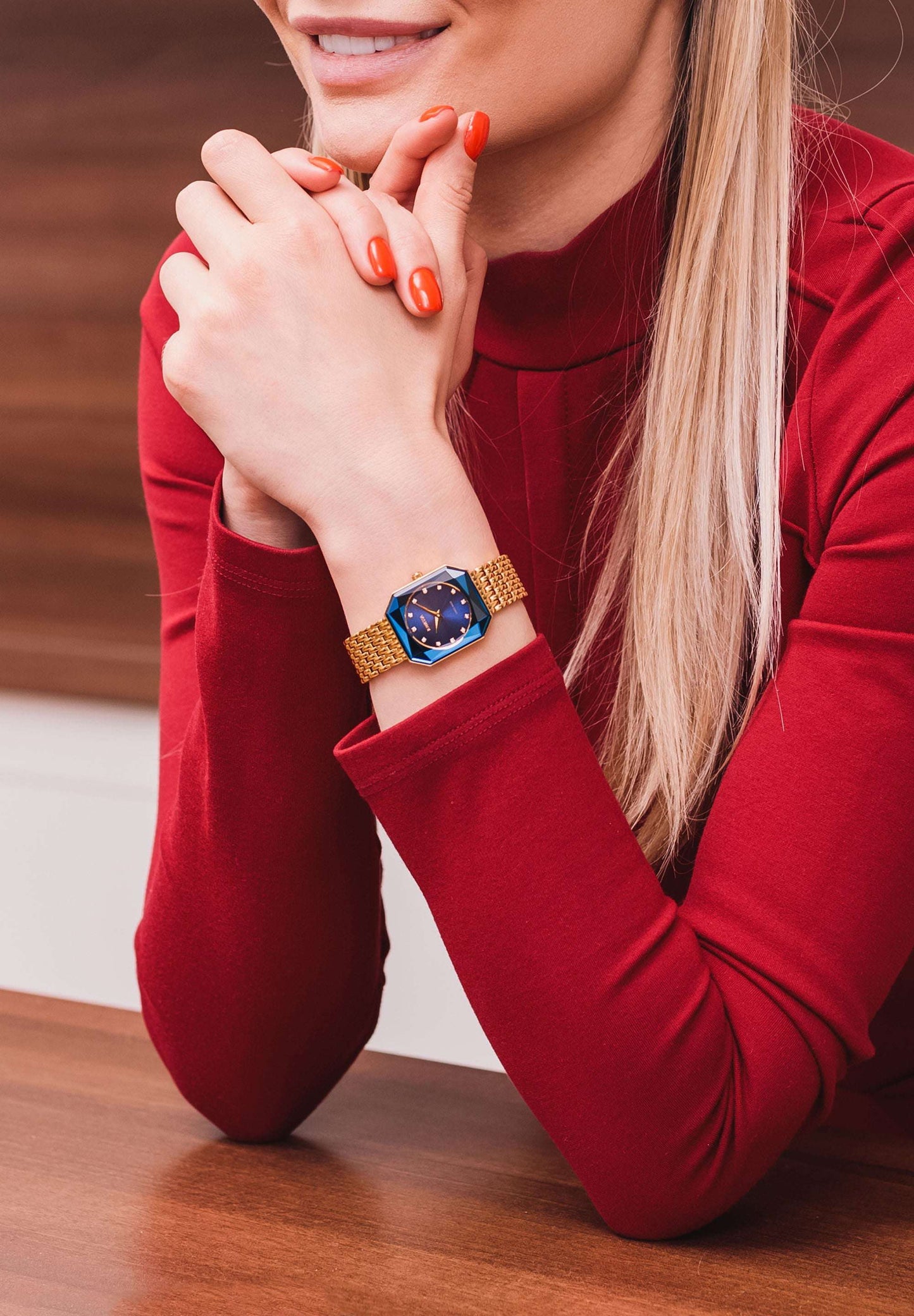 gold blue jowissa swiss made ladies watch with golden stainless steel bracelet. Modern womens fashion watch with a special rectangle form