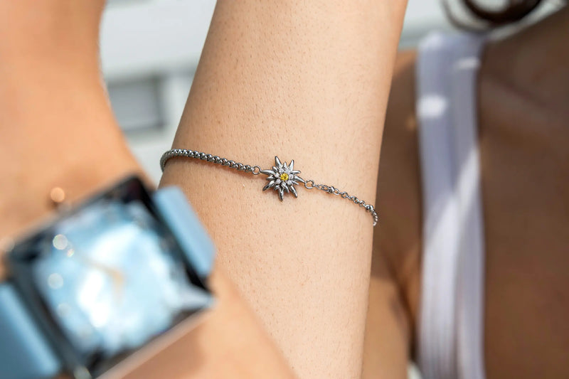 Jowissa Jewelry Bracelet made of Stainless Steel with edelweiss Flower pendant charm and cubic circonia stones.