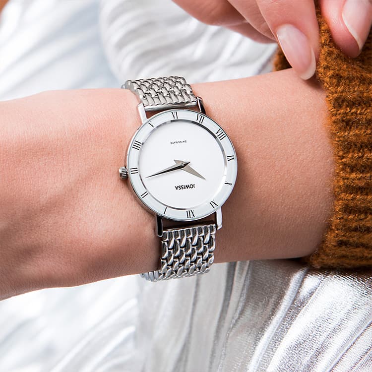 Roman Numeral Watch Roma by Jowissa. White dial and stainless steel watch bracelet. Black Roman numerals on white bezel.