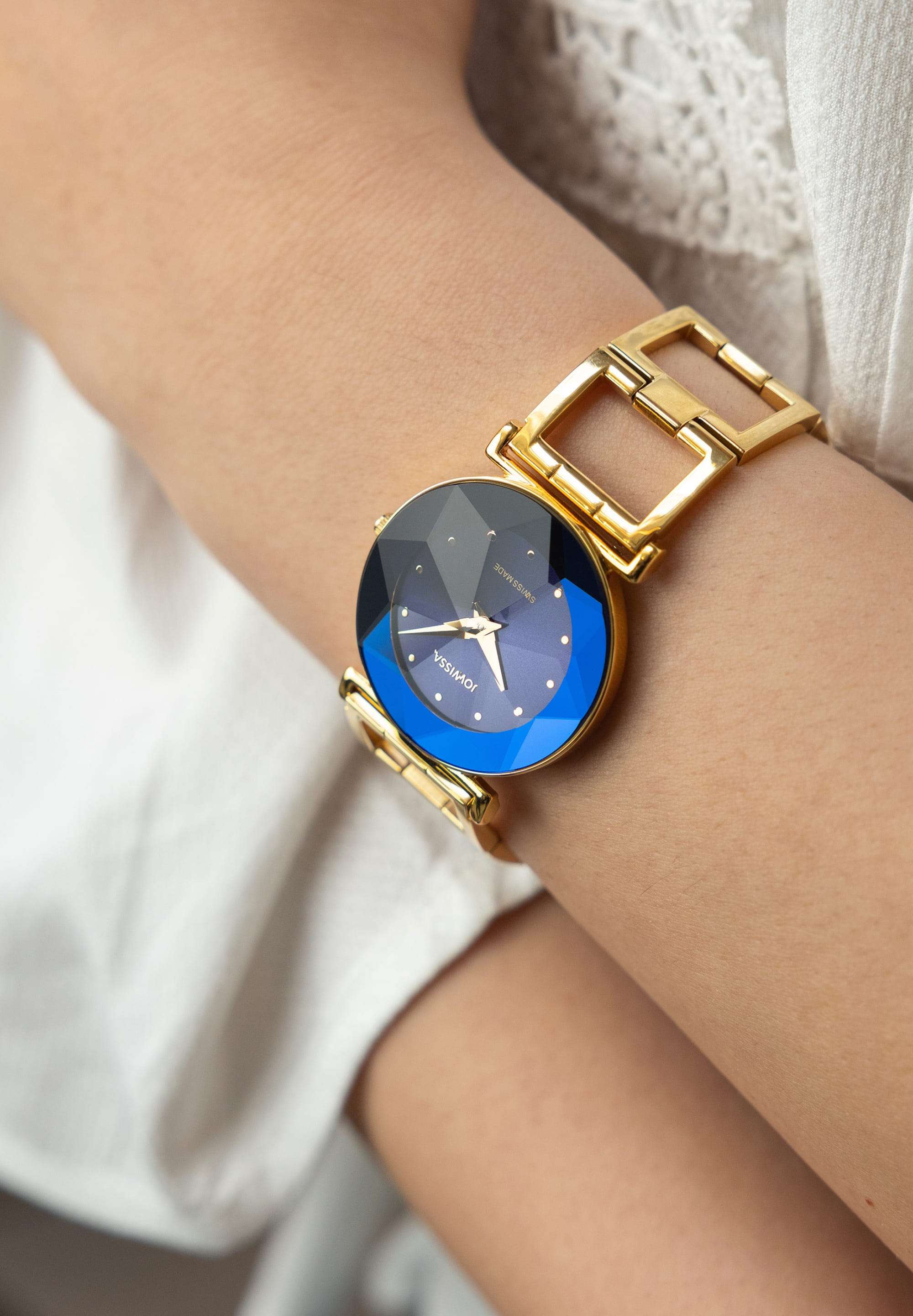 The special Jowissa facet swiss made ladies watch with the round blue dial and a special cut combined to a fashion gold strip.
