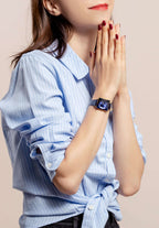 Swiss ladies watch with blue leather strap and blue dial - blue swiss watch for women - worn by a girl with blue shirt