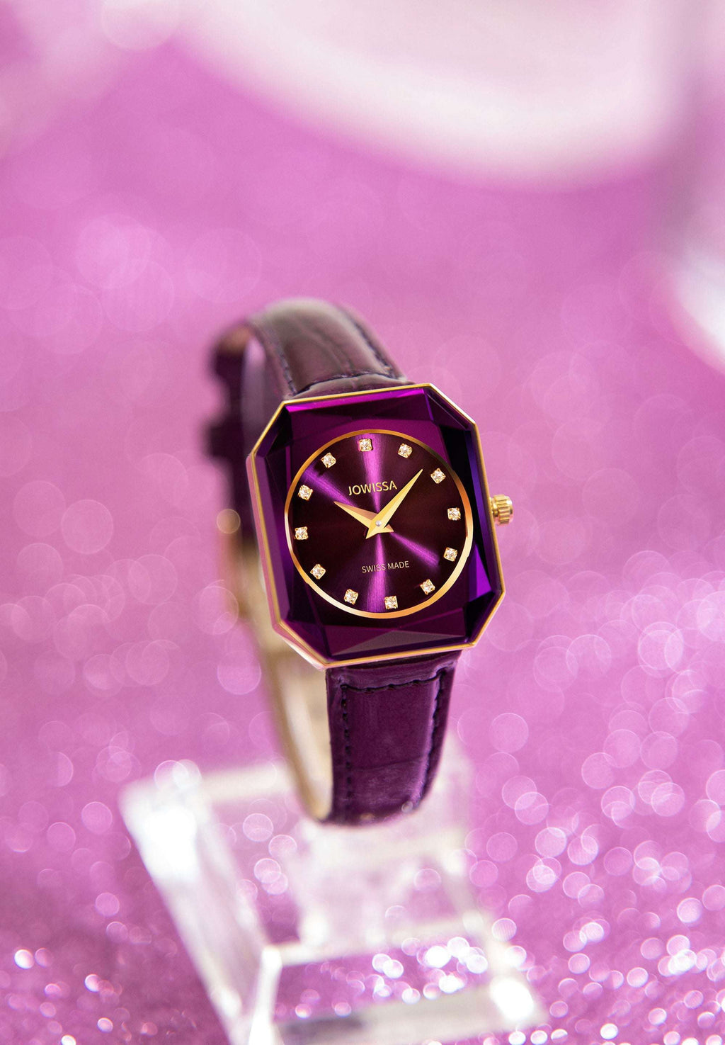Swiss womens watch with purple strap and dial and gold details in the front - all swiss made watch for women