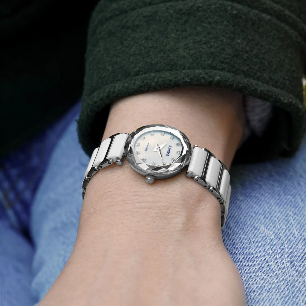 White and silver petite ladies watch with a scratch resistant ceramic bracelet and sapphire crystal. All Swiss Made.
