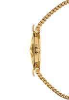 Close-up side profile of a gold-tone ladies watch with a beaded bracelet, showing the side case, crown, and bracelet links. Facet Strass Swiss Made timepiece.