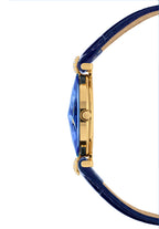 Side profile of a luxury watch featuring a vibrant blue crystal case, a polished gold-tone case, and a deep blue leather strap with a tan interior lining. All Swiss Made.