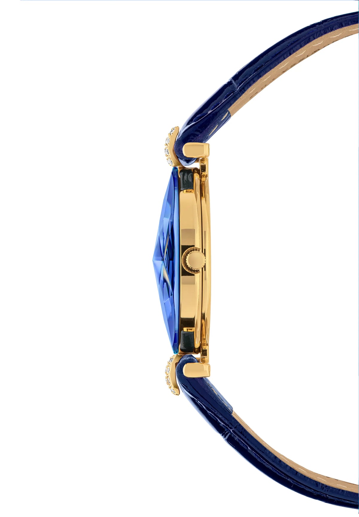 Side profile of a luxury watch featuring a vibrant blue crystal case, a polished gold-tone case, and a deep blue leather strap with a tan interior lining. All Swiss Made.
