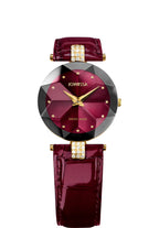 A Jowissa women's watch featuring a beautifully faceted crystal, a dark red sunray dial, a black bezel, a matching dark red alligator leather strap, and gold-tone accents including two crystal decor elements.