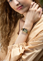 Facet Emerald ladies watch by Jowissa. A gold watch with a octangular case and a fine stainless steel bracelet. The facetted Glas looks spectacular. All Swiss Made