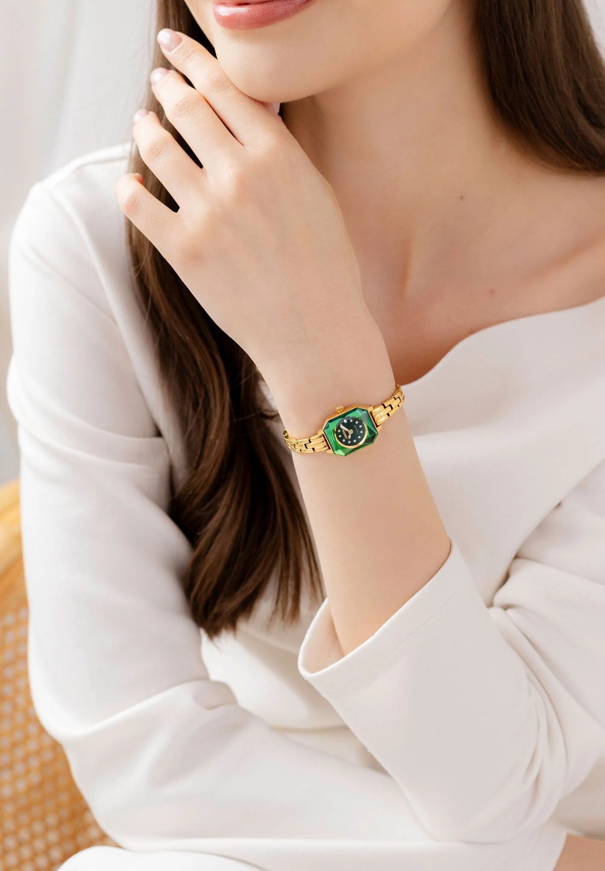 Trendy gold and green tiny ladies watch. Swiss Made with an octagonal case shape and a small stainless steel bracelet.