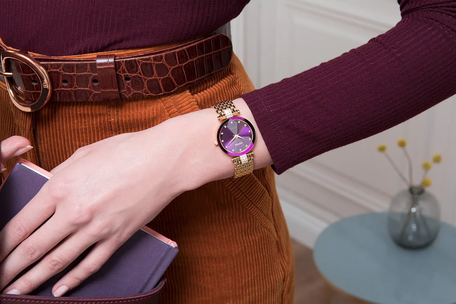 30mm Swiss Gold watch for women with gold bracelet and purple dial. Part of the Facet Strass Collection by Jowissa, this affordable Swiss luxury dress watch features signature diamond-cut glass.