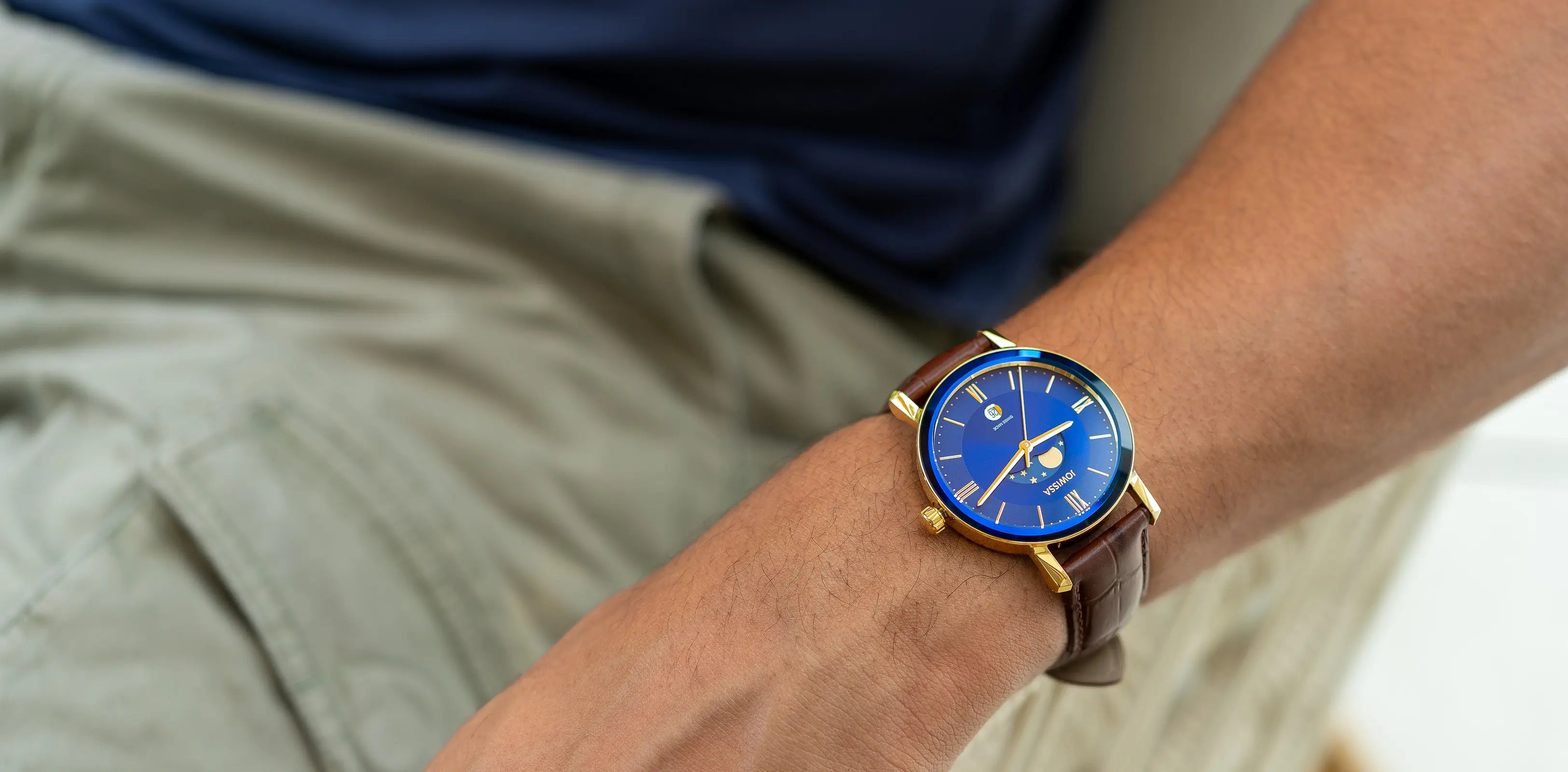 Brown watch for men - with brown leather strap and blue dial - with details of the moon and stars in the front and gold color - all swiss made moonphases watch