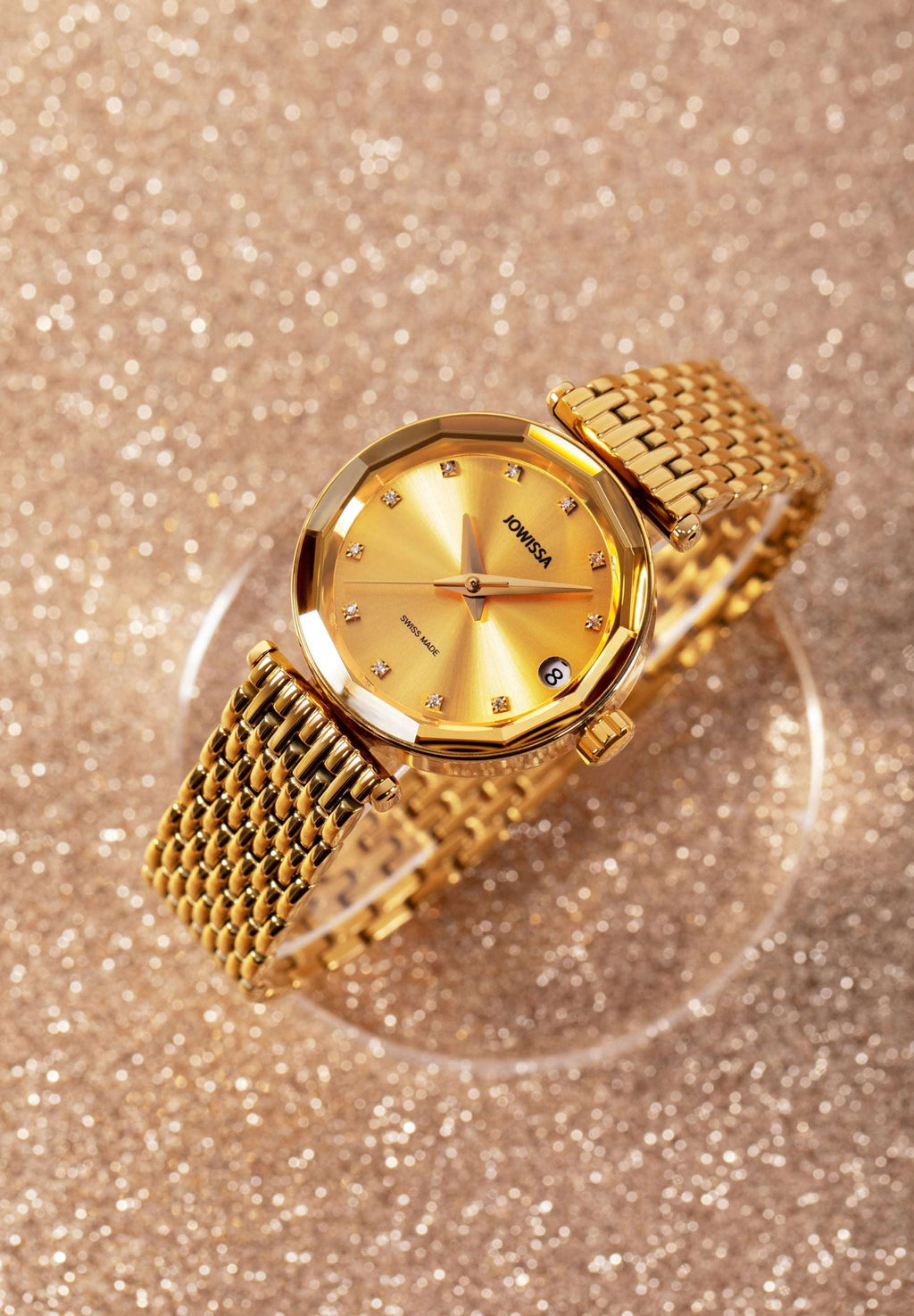 Swiss Automatic womens Watch -J1.282.M is a luxurious womens timepiece featuring a 30.5mm gold-plated stainless steel case and a stainless steel bracelet. Its sunray dial is adorned with 11 diamond indices, while the scratch-resistant sapphire crystal creates beautiful light reflections. This Swiss-made watch is powered by a Ronda R150 automatic movement with a 40-hour power reserve, and it includes a date window.