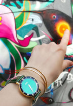 Green swiss watch for ladies - with green leather strap and green dial - has black details on the front