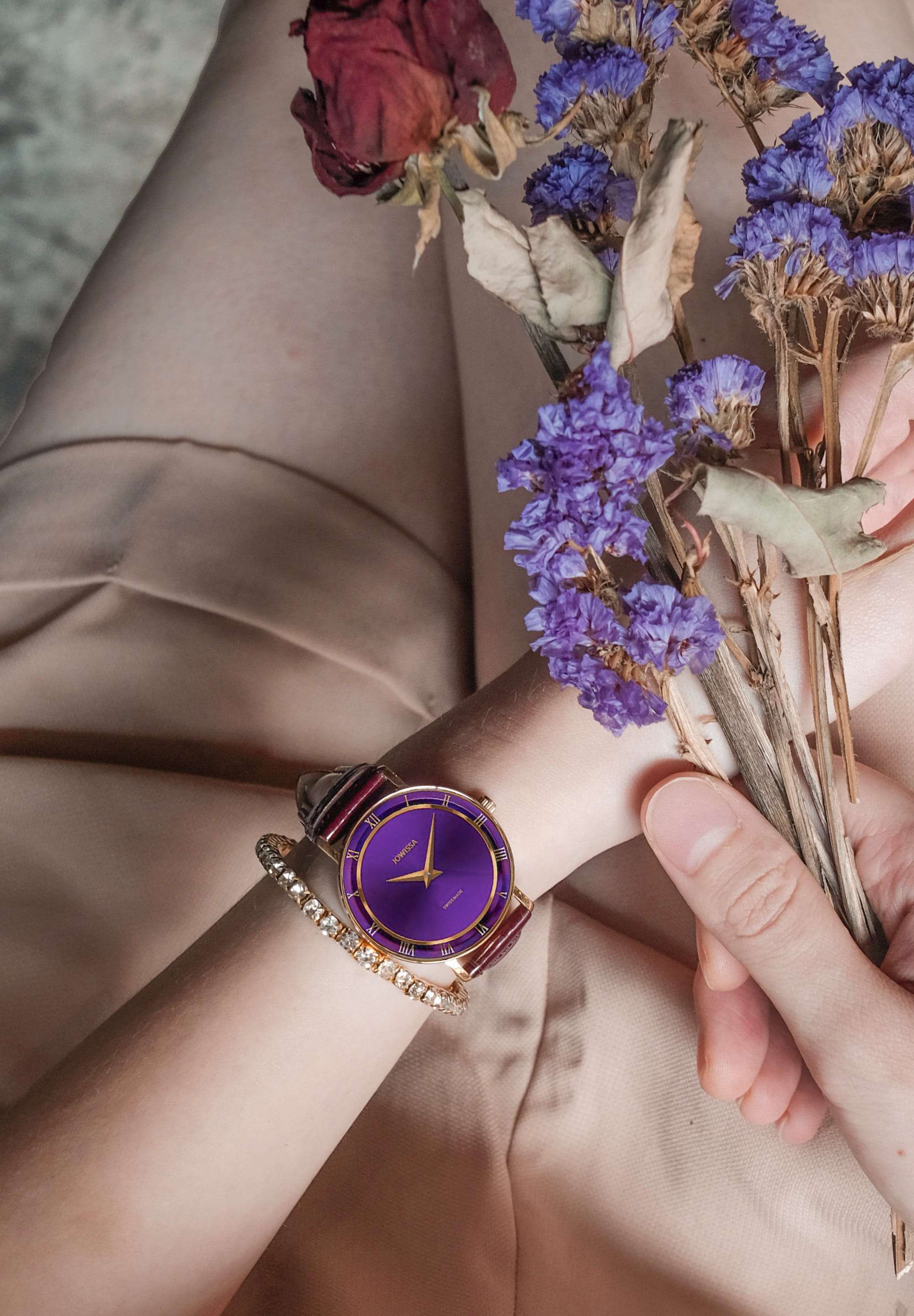 Purple watch made for ladies - swiss made watch purple leather strap with gold details - woman wearing purple watch with flowers
