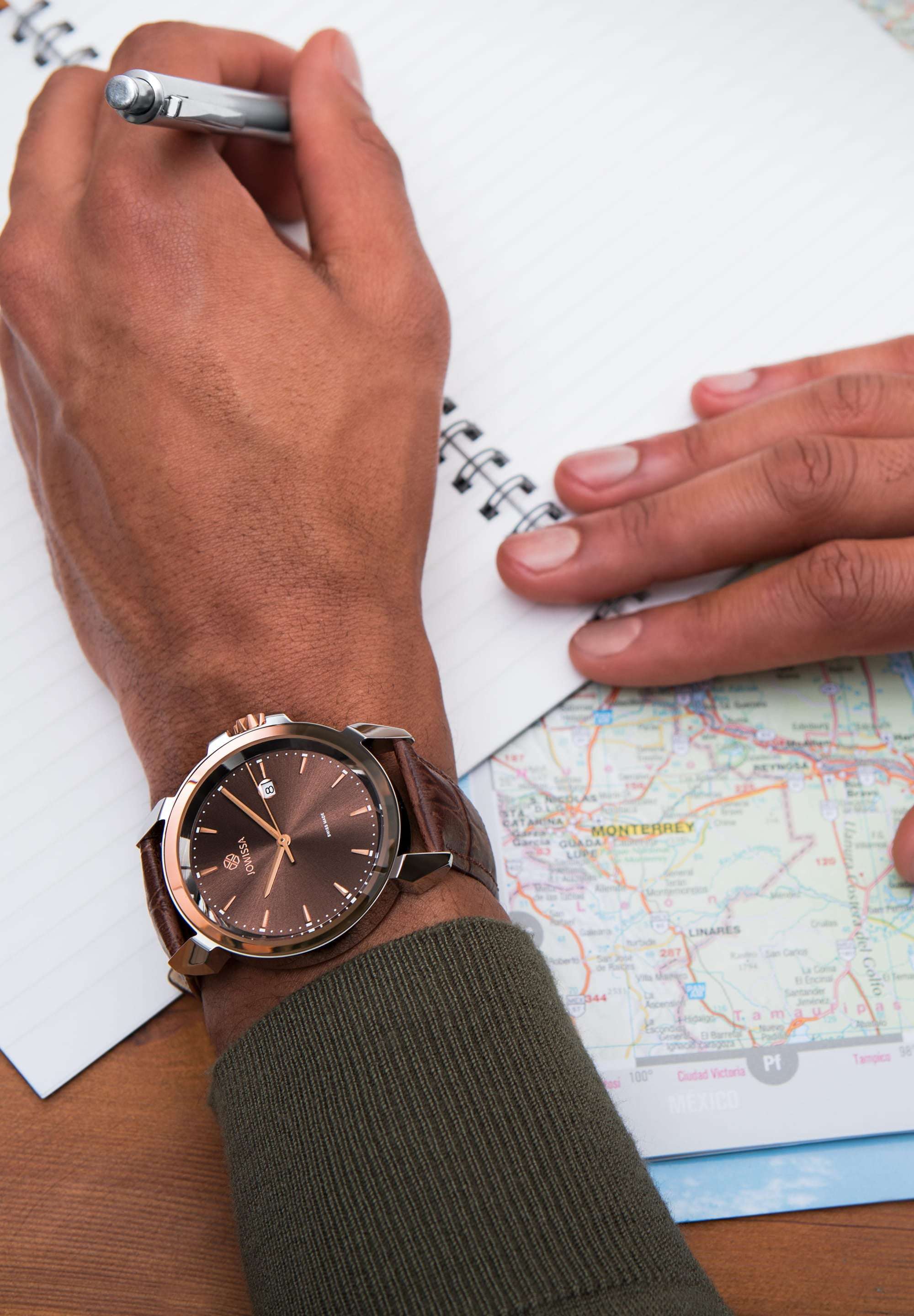 Brown swiss made watch for men - with  brown leather strap and brown dial - the watch is made in switzerland