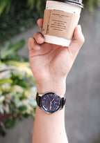 Black swiss watch - with black leather strap and blue dial with silver details - all swiss made