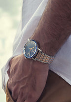 Silver watch for men - all swiss made - with blue dial and gold details 