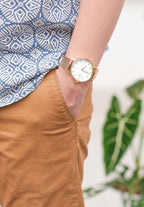 Gold jowissa watch for men - worn by a man with orange pants and blue shirt - watch made in switzerland 