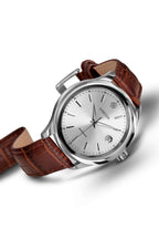 J4.197.L brown watch made for men  - has a stainless steel case with a 45mm diameter - includes a calendar window - has a classic brown leather strap - Swiss made and designed for both business and leisure.