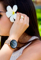 J4.234.M unisex watch made for men and women - has a stainless steel case -comes with tempered Mineral Glass - the watch is gold and black - size medium - all swiss made