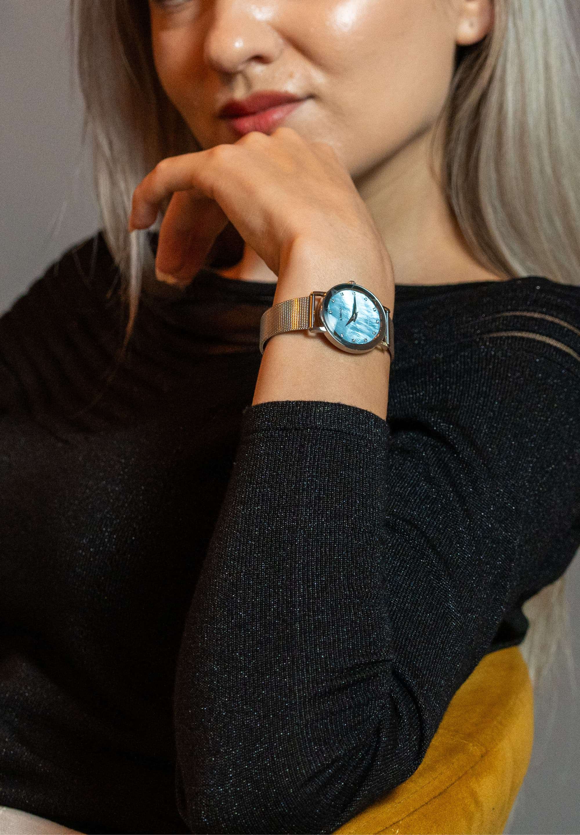 Jowissa Swiss Womens Watch Facet with Mesh Bracelet and mother of pearl dial. on Lady with black sweatshirt