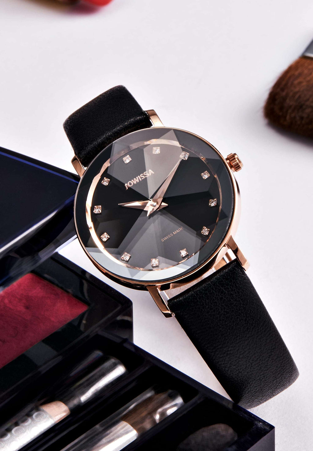 Swiss facet watch for ladies - with gold details in the front and black leather strap -all swiss made watch