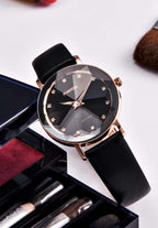 Swiss facet watch for ladies - with gold details in the front and black leather strap -all swiss made watch