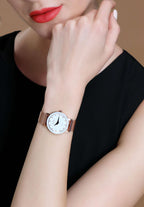 Swiss watch for ladies - watch with white dial and gold strap worn by a girl with red lips - made in switzerland