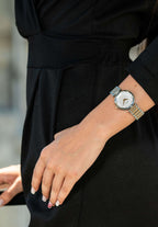 Silver and gold swiss watch for ladies - all swiss made watch for women with silver and gold details in the strap and light pink dial 