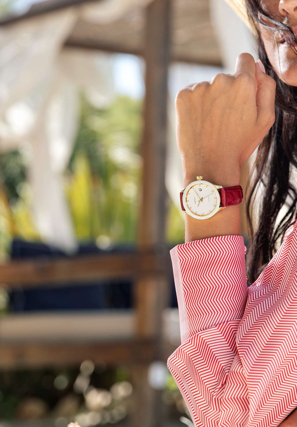 Red Jowissa Watch with white details-  with 12 rhinestone hour markers, and a diamond-cut bezel. Powered by a Ronda Swiss quartz movement, it includes a date window and Dauphine-style hands. The red genuine patent leather strap adds a bold touch. With 5 ATM water resistance - from switzerland