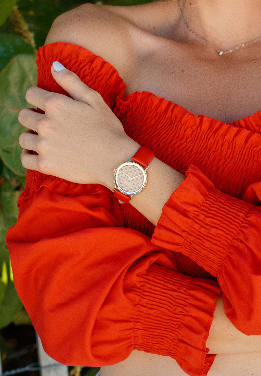 Jowissa swiss ladies watch. A modern pattern dial matched with an attractive red strap an womans  top