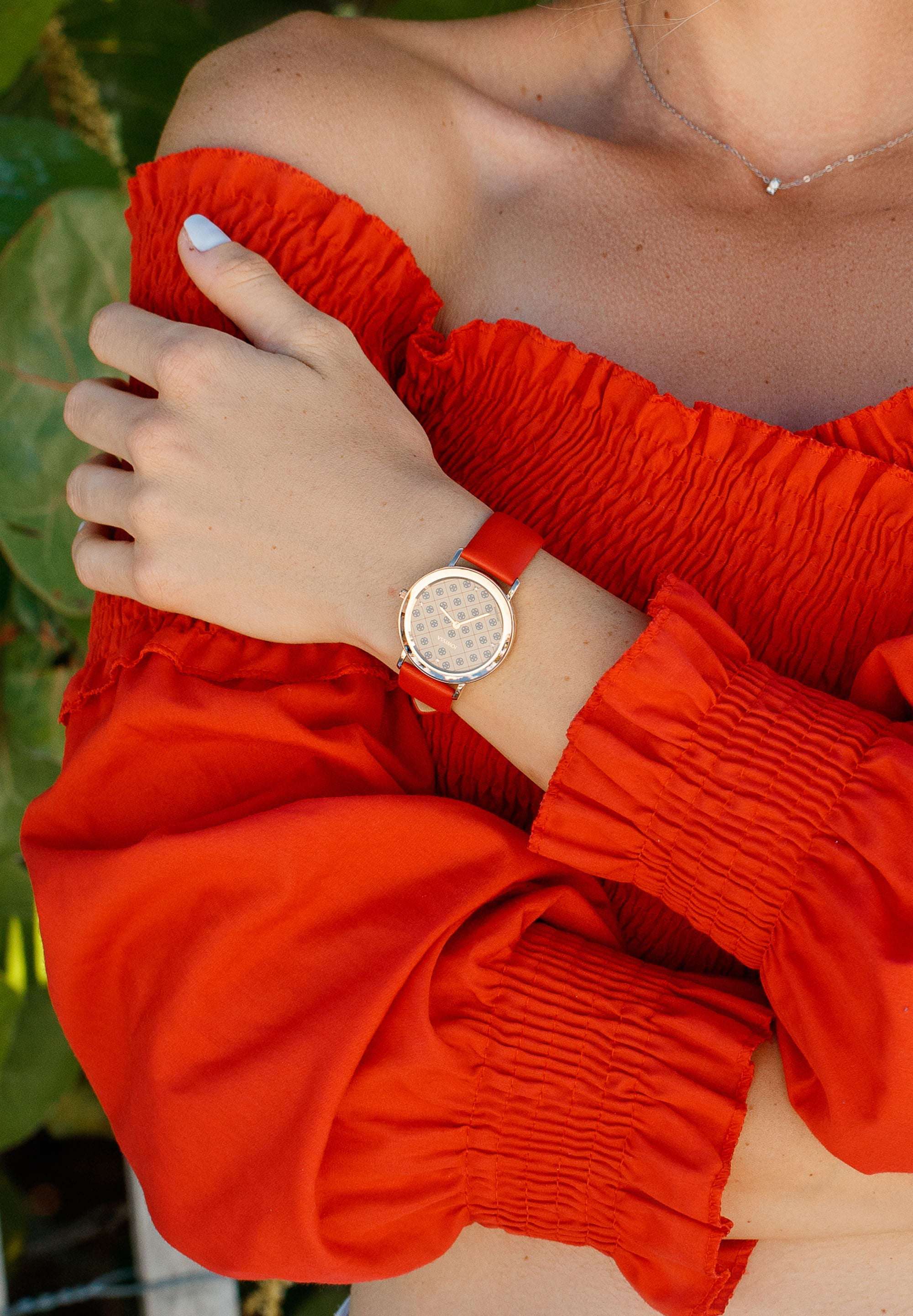 Jowissa swiss ladies watch. A modern pattern dial matched with an attractive red strap an womans  top