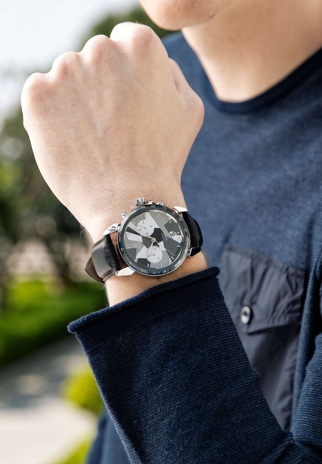 Black swiss watch for men with black strap and silver and white dial  made in switzerland 