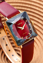 Red swiss watch - with red leather strap and red dial with gold details in the front - all swiss made