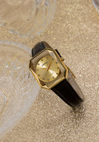 Swiss womens watch - with black leather strap and gold dial - all swiss made