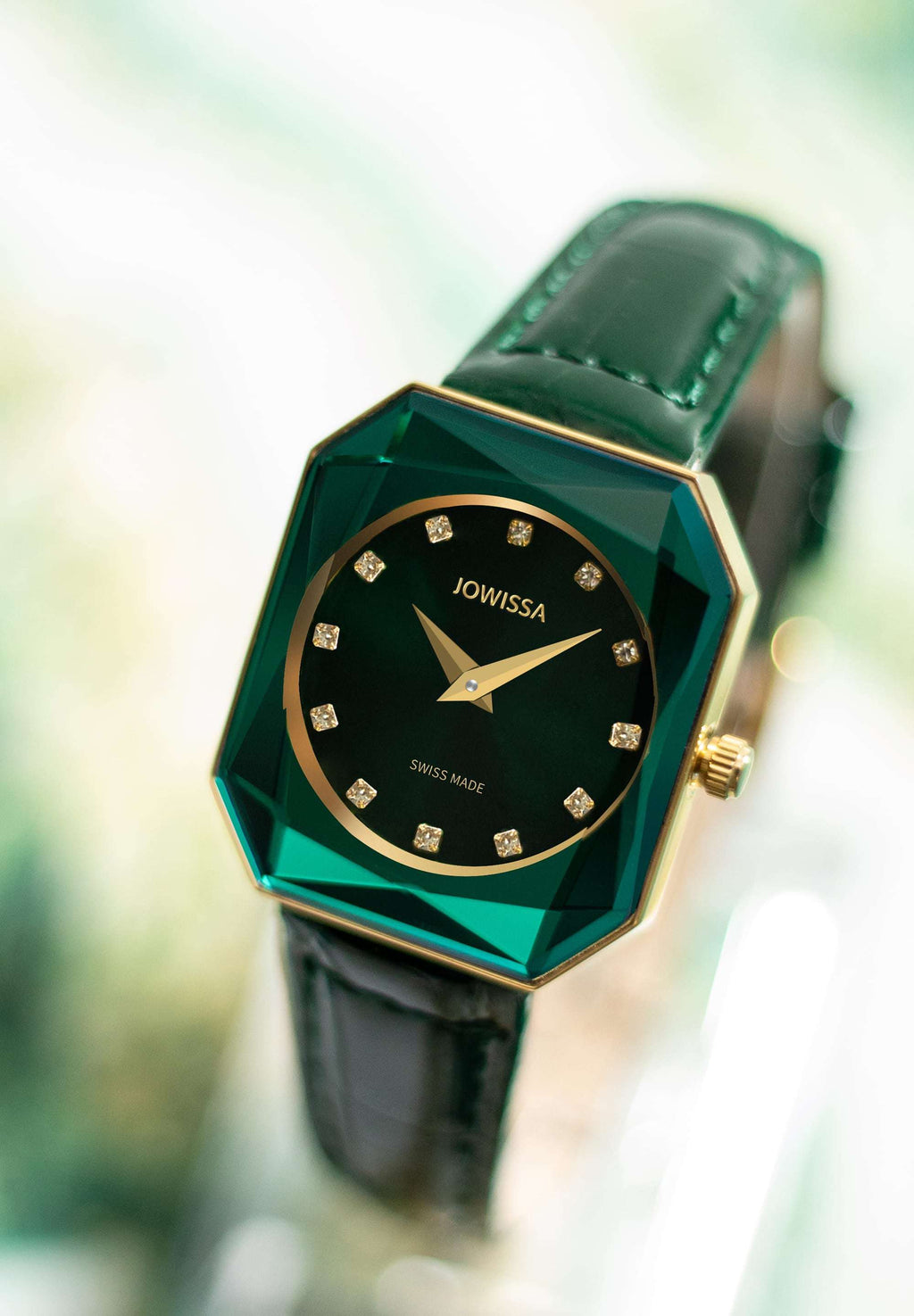 Swiss ladies watch with green strap and dial and gold details in the front - all swiss made watch for women