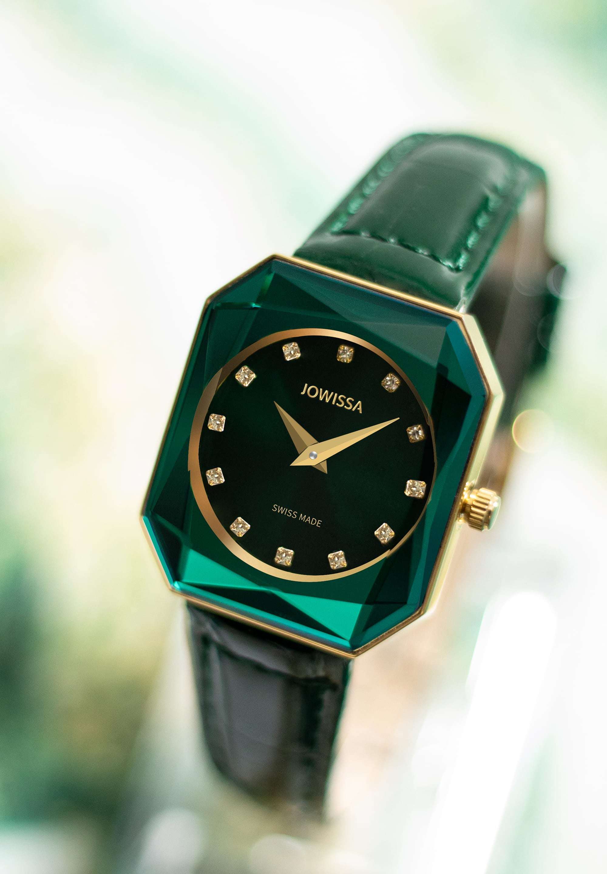 Swiss ladies watch with green strap and dial and gold details in the front - all swiss made watch for women