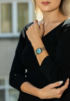 Blue swiss womens watch - with gold and silver strap and blue dial - all swiss made watch for ladies
