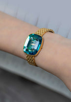 Gold swiss watch with gold strap and green dial - all swiss made watch for women