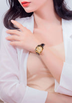 Swiss ladies watch facet radiant worn by a girl with white shirt - all swiss made with black leather strap and gold dial