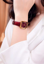 Swiss red watch for women with red strap and dial and gold details in the front - all swiss made watch for ladies