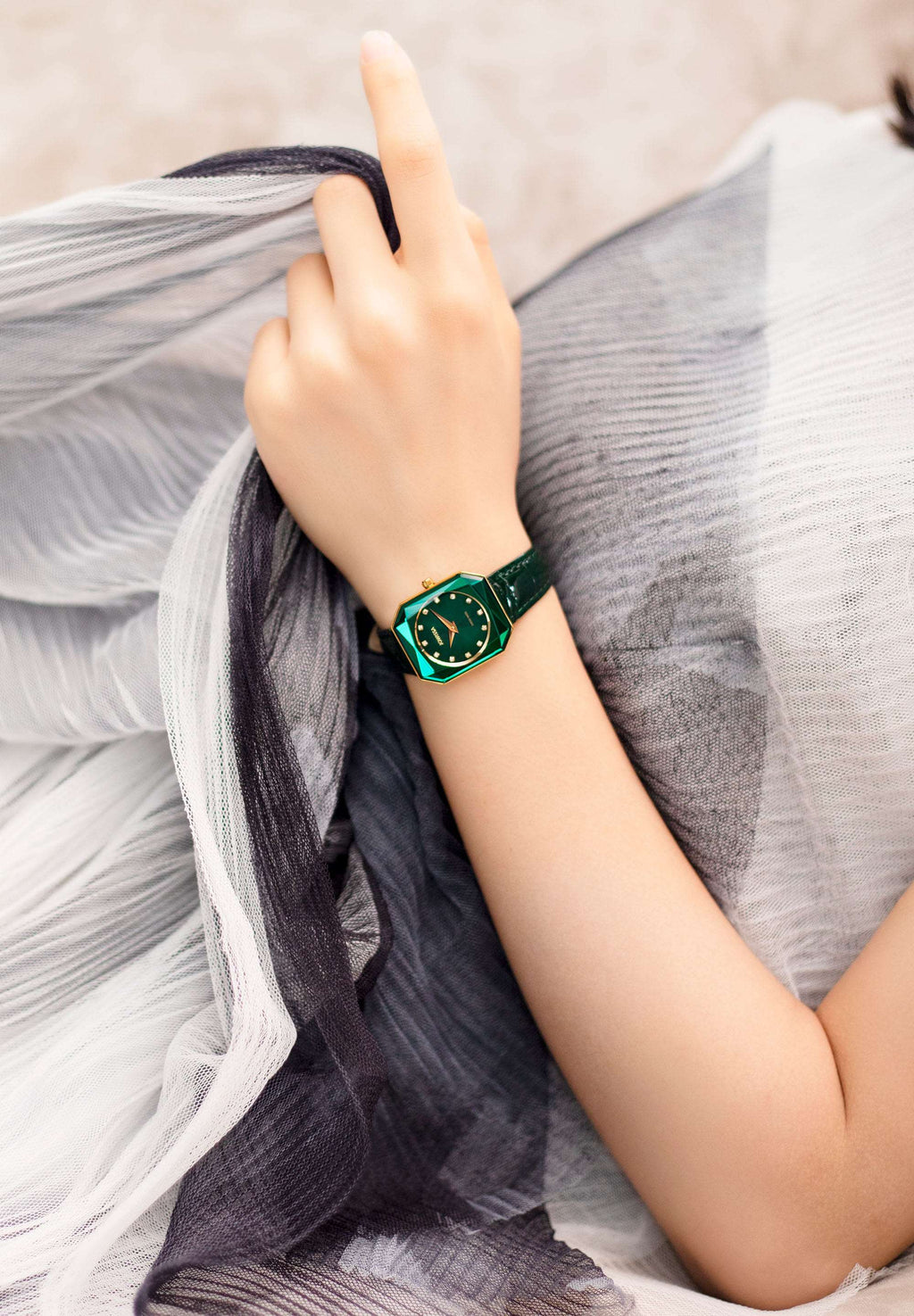 Green watch for ladies - with green strap green dial and gold details in the front - all swiss made watch for ladies