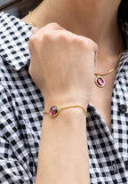 Halskette und Armband mit violettem Stein. Edelstahlschmuck von Jowissa.