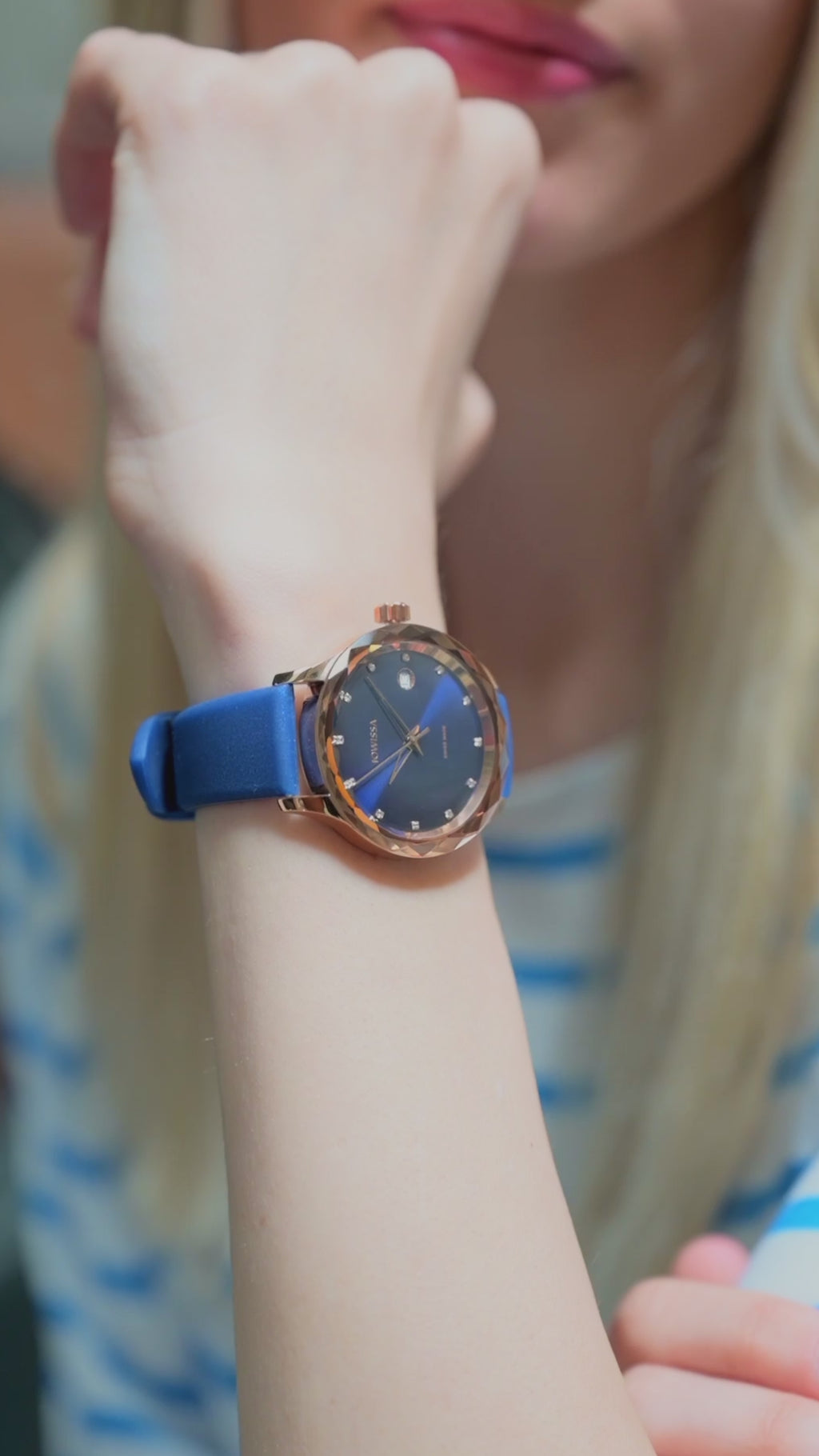 Swiss blue watch for woen with blue leather strap and blue dial with gold details in the front - all swiss made watch
