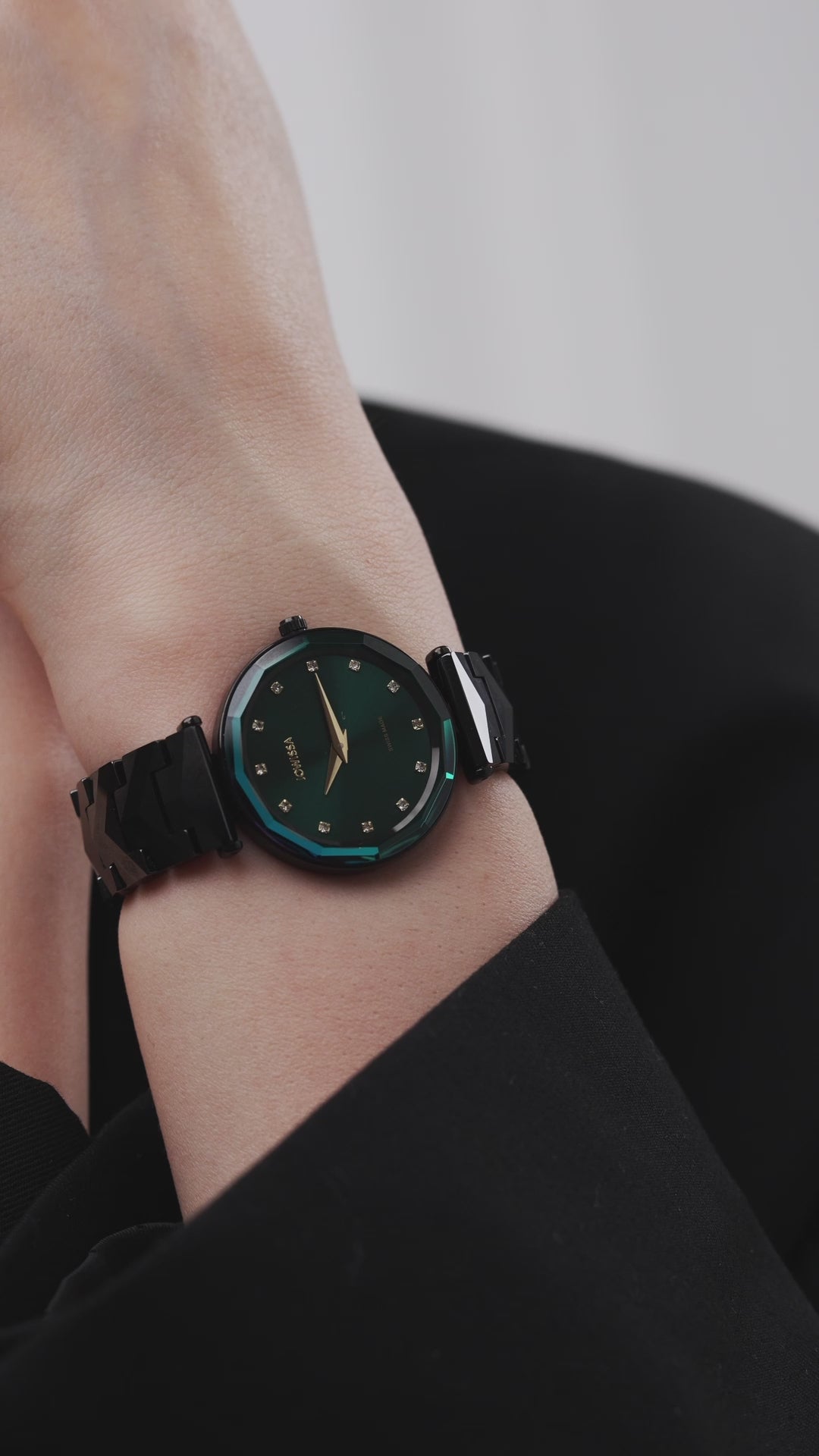 Swiss black watch for women with black strap and black dial with gold details in the front. - all swiss made watch for ladies