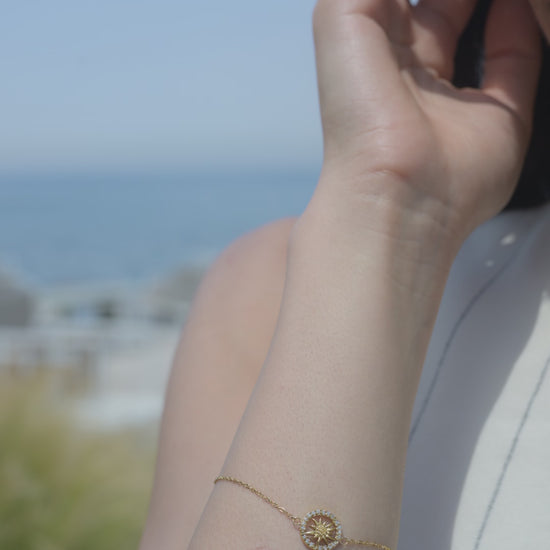 A woman wearing a jowissa bracelet - she is wearing a swiss jowissa gold bracelet - all swiss made