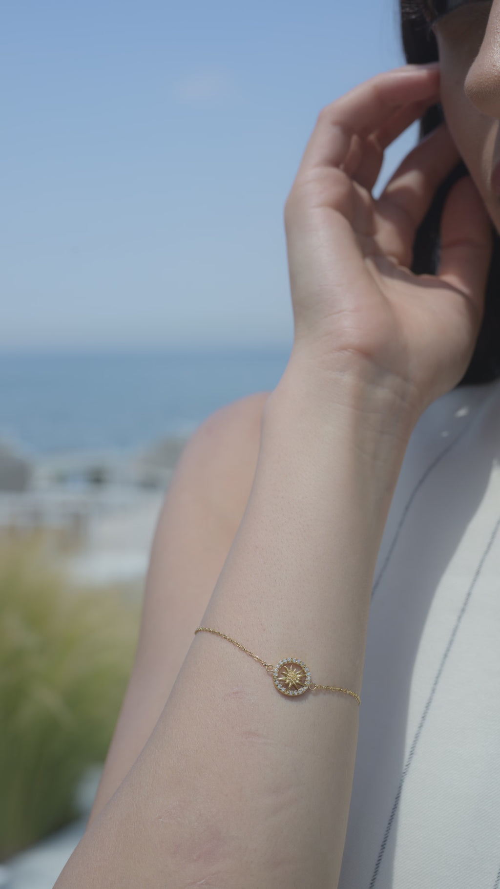 A woman wearing a jowissa bracelet - she is wearing a swiss jowissa gold bracelet - all swiss made