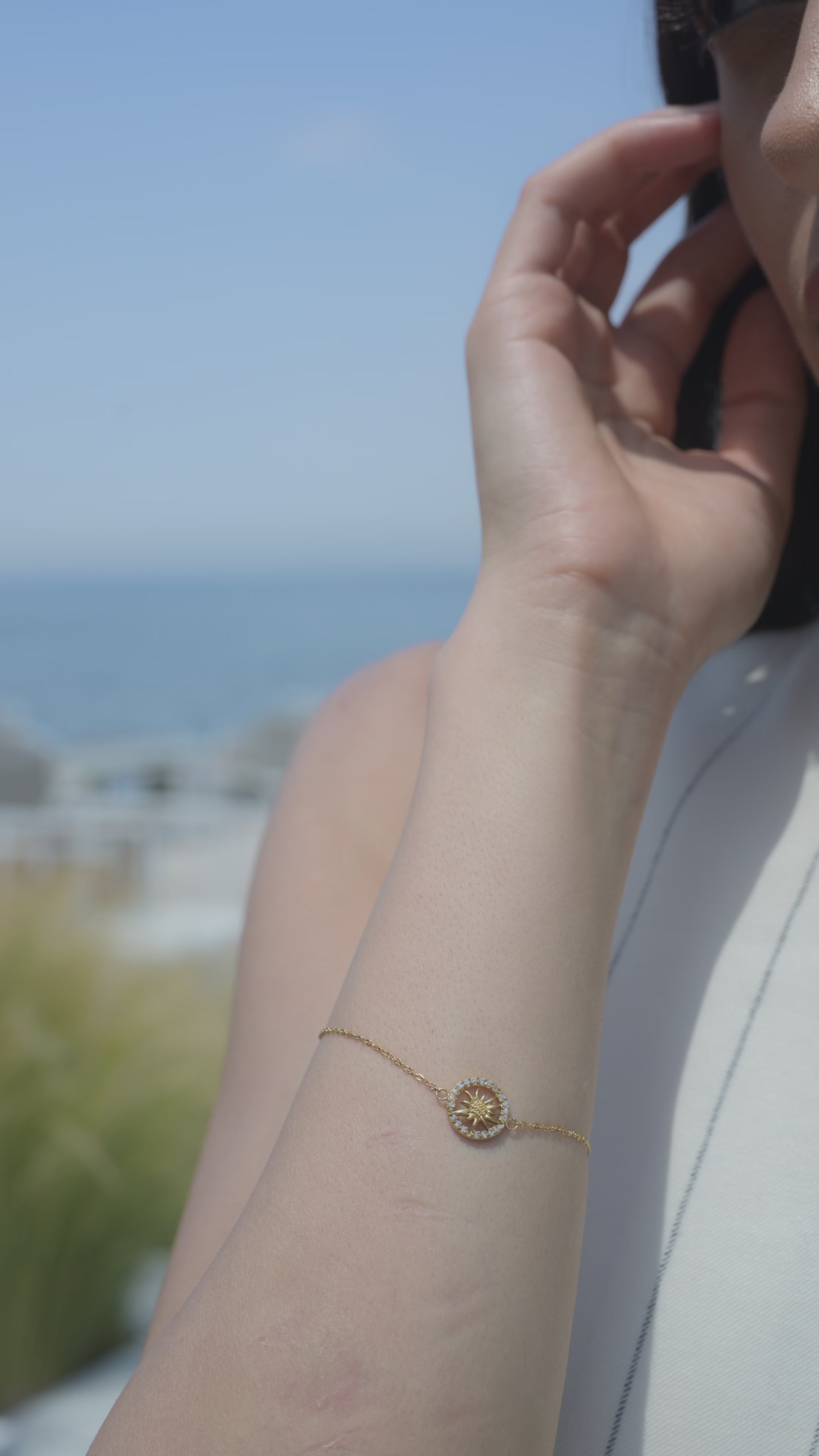 A woman wearing a jowissa bracelet - she is wearing a swiss jowissa gold bracelet - all swiss made